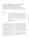 Aesthetic Management of External Skin Paddles Following Microvascular Reconstruction of the Head and Neck