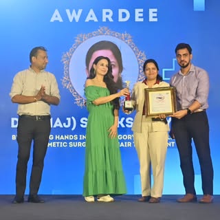 Receiving the Healing Hands Award 2.0 for Excellence in Cosmetic & Hair Transplant by BIG FM 92.7 wa