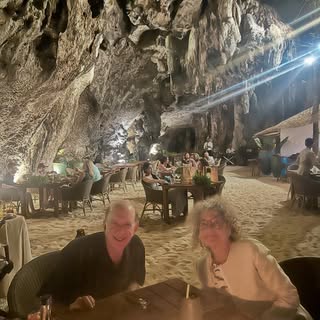 Dinner in a Grotto on the beach at the edge of the ocean in Krabi-now only memories because we are b