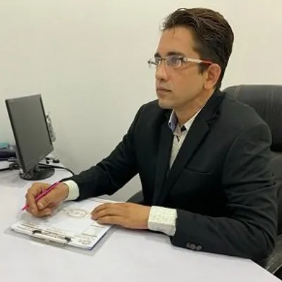 Dr. Naveen Dahiya