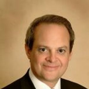 Dr. Daniel E. Rousso