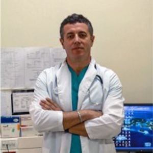 Dr. Maksim Llambro