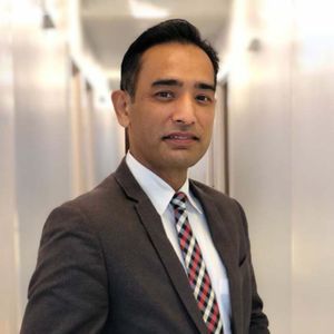 Dr. Krishna Manandhar