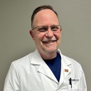 Dr. John T. Fraker