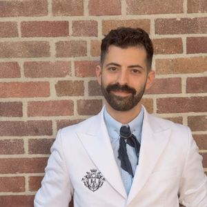 Dr. Justin E. Rome