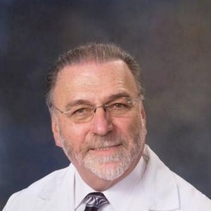Dr. Carlos J. Puig