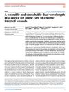 A Wearable and Stretchable Dual-Wavelength LED Device for Home Care of Chronic Infected Wounds